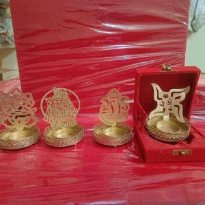 Metal Ganesh Laxmi Radhakrishna Swastik Pooja T Light Diya with Box Gift Set